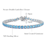 "Délice Joyeux" Bracelet Tennis en Argent Sterling Topaze Bleue