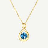 "Étreinte Infinie" Pendentif en Argent Sterling avec Symbole d'Infini et Pierre de Naissance de Décembre en Topaze - Or