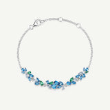 Bracelet en argent "Chuchotement de glycine" avec barre fleur aquamarine topaze