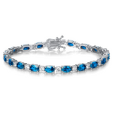 "Glamour Radiance" Bracelet en argent sterling avec topaze bleue taillée fantaisie, pierre de naissance de décembre