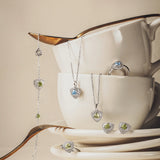Trinity Textured Silver Earrings in Created Peridot