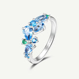 Bague en argent topaze aquamarine "Wisteria Whisper" Flower Bar