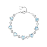 Bracelet en argent sterling Tennis Aquamarine de la pierre de naissance de mars FANCIME "Ms Charming" Halo Heart