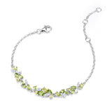 Bracelet en argent "Chuchotement de glycine" avec barre fleur péridot