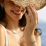 Collier en argent "Chuchotement de glycine" avec barre fleur aquamarine topaze
