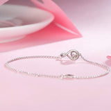 "Infinite Embrace" Bracelet en argent sterling avec pierre de lune, symbole de l'infini, pierre de naissance de juin