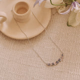 Collier en argent "Chuchotement de glycine" avec barre fleur tourmaline rose