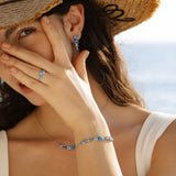 Bague en argent topaze aquamarine "Wisteria Whisper" Flower Bar
