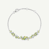 Bracelet en argent "Chuchotement de glycine" avec barre fleur péridot