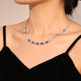 Collier tennis en argent sterling avec topaze bleue taillée fantaisie, pierre de naissance de décembre "Radiance Glamour"