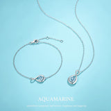 "Infinite Embrace" Bracelet en argent sterling avec aquamarine, symbole de l'infini, pierre de naissance de mars