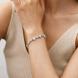 Bracelet en argent sterling Tennis Aquamarine de la pierre de naissance de mars FANCIME "Ms Charming" Halo Heart