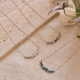Collier en argent "Chuchotement de glycine" avec barre fleur aquamarine topaze