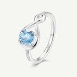 Bague de Promesse Étreinte Infinie en Topaze