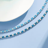 "Glamour Radiance" Bracelet en argent sterling avec topaze bleue taillée fantaisie, pierre de naissance de décembre