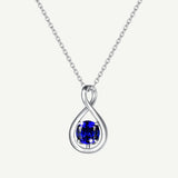 Pendentif en argent sterling "Étreinte Infinie" avec symbole infini et saphir de la pierre de naissance de septembre - Argent