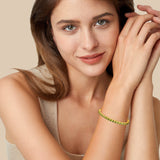 "Élégance Éternelle" Bracelet de Tennis en Péridot en Argent Sterling avec Chaîne Bolo Classique