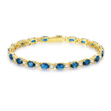 "Glamour Radiance" Bracelet en argent sterling avec topaze bleue taillée fantaisie, pierre de naissance de décembre