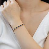 "Glamour Radiance" Bracelet en argent sterling avec saphir bleu taillé fantaisie, pierre de naissance de septembre