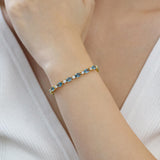 "Glamour Radiance" Bracelet en argent sterling avec topaze bleue taillée fantaisie, pierre de naissance de décembre