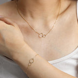 Bracelet en or massif 14K avec deux cœurs entrelacés à l'infini FANCIME