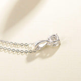 Collier en or blanc 14K FANCIME Moissanite Infinity Ribbon Solitaire
