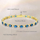 "Glamour Radiance" Bracelet en argent sterling avec topaze bleue taillée fantaisie, pierre de naissance de décembre