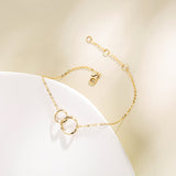 Bracelet en or massif 14K avec deux cœurs entrelacés à l'infini FANCIME