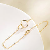 Bracelet en or massif 14K avec deux cœurs entrelacés à l'infini FANCIME