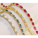 "Glamour Radiance" Bracelet en argent sterling avec topaze bleue taillée fantaisie, pierre de naissance de décembre